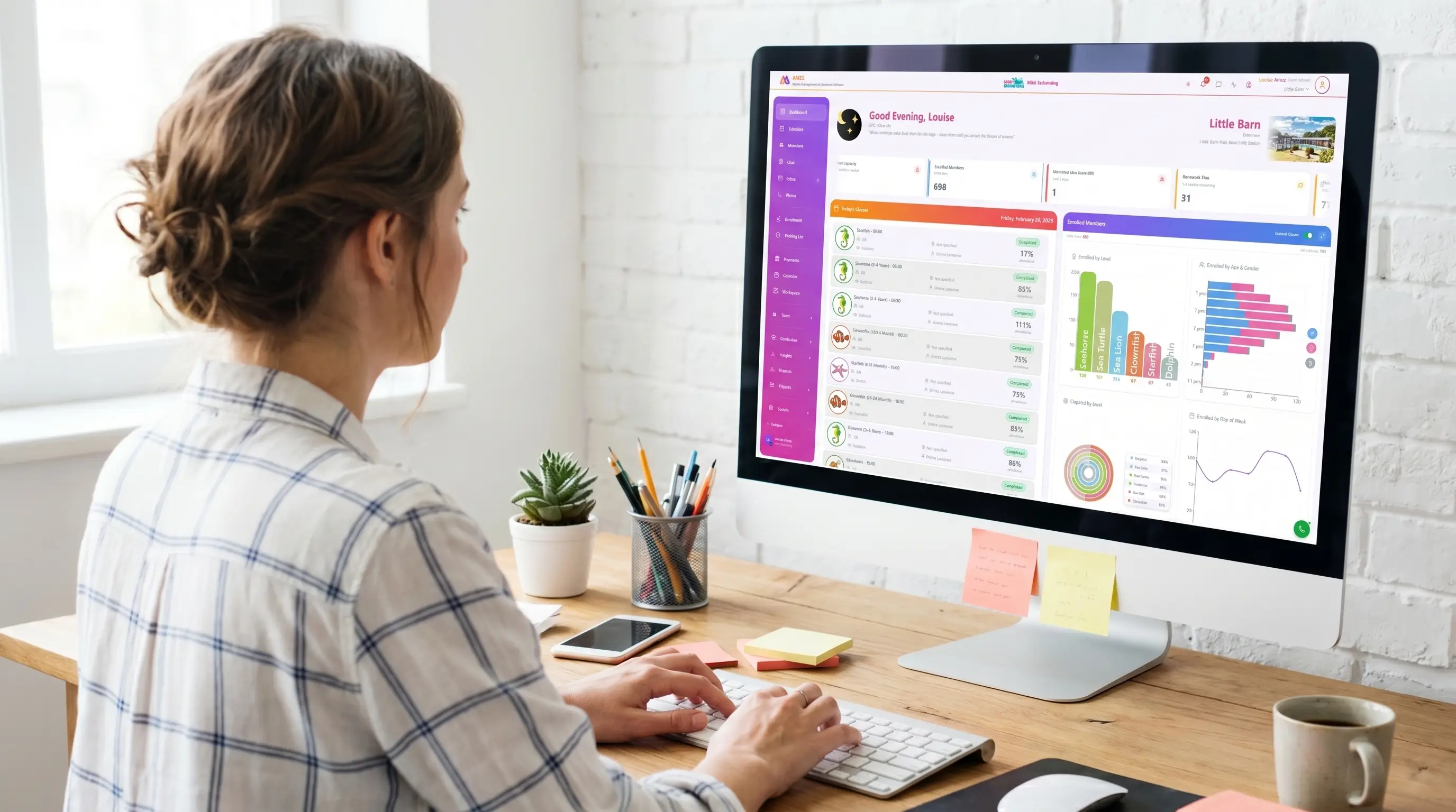 Activity business operator reviewing AMES on a desktop screen